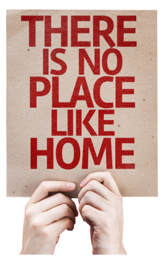Theres No Place Like Home sign being held